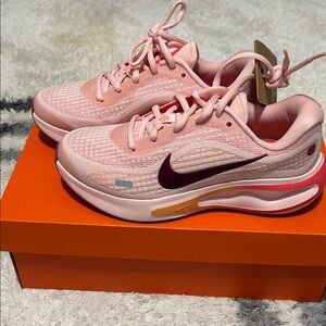 New in box. Nike Women's Journey Run Pink and Purple Athletic ComfiRise Sneakers